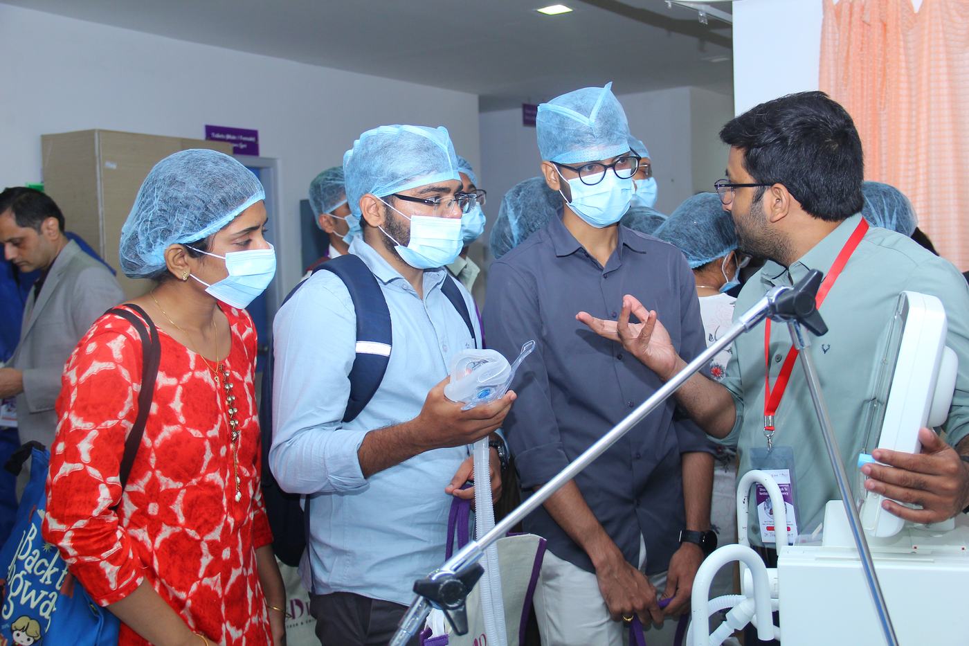 Dr. Suchit Jogu demonstrating ventilation equipment to visiting delegates at KIMS Cuddles PICU, Kompally